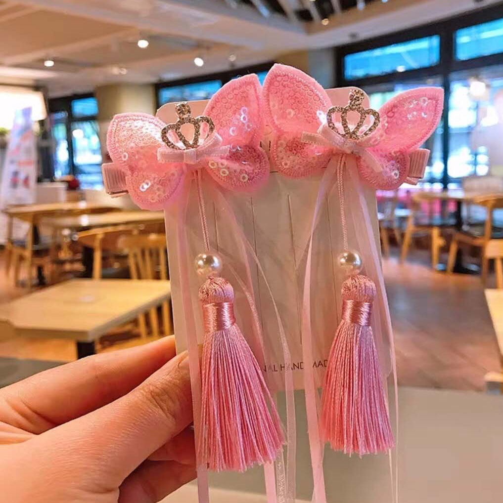 Long ribbon tassel clamping