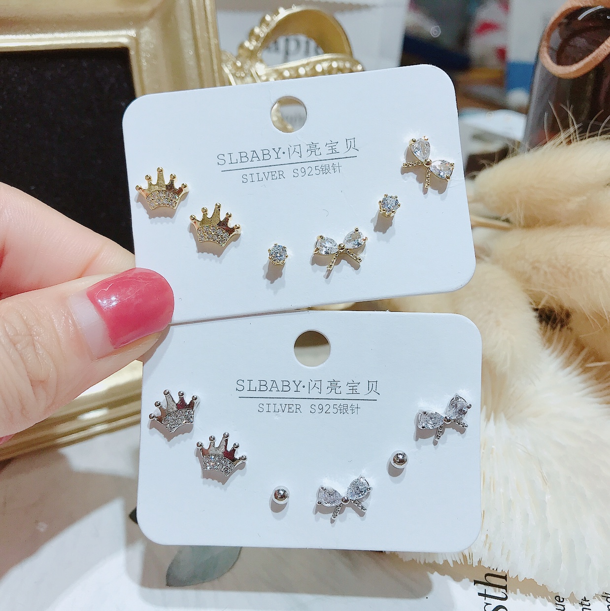 S925 silver needle crown bow with multiple pairs of earrings thumbnail