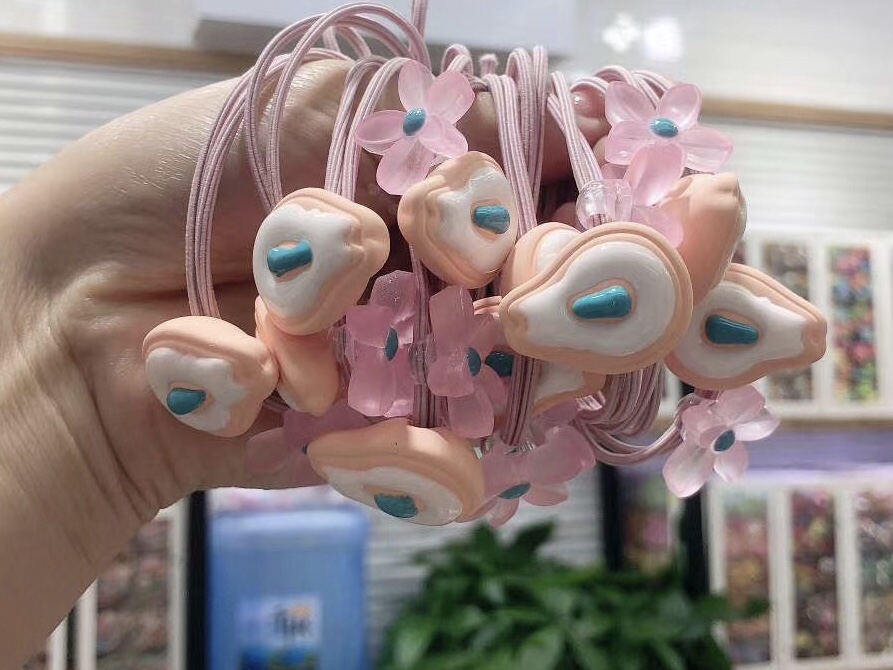 Green Phantom Hair Accessory Close-Up Detail