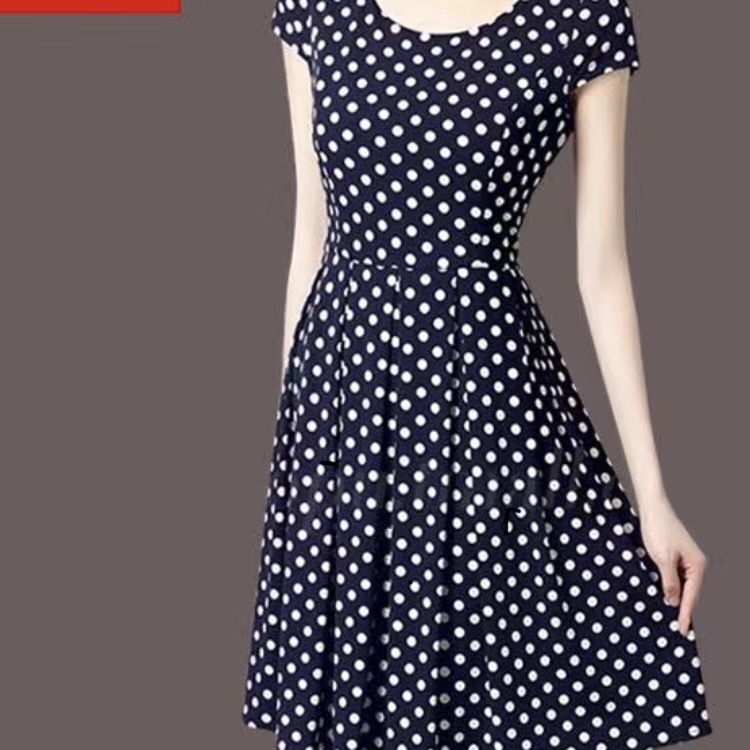 A long dress with dark blue spots