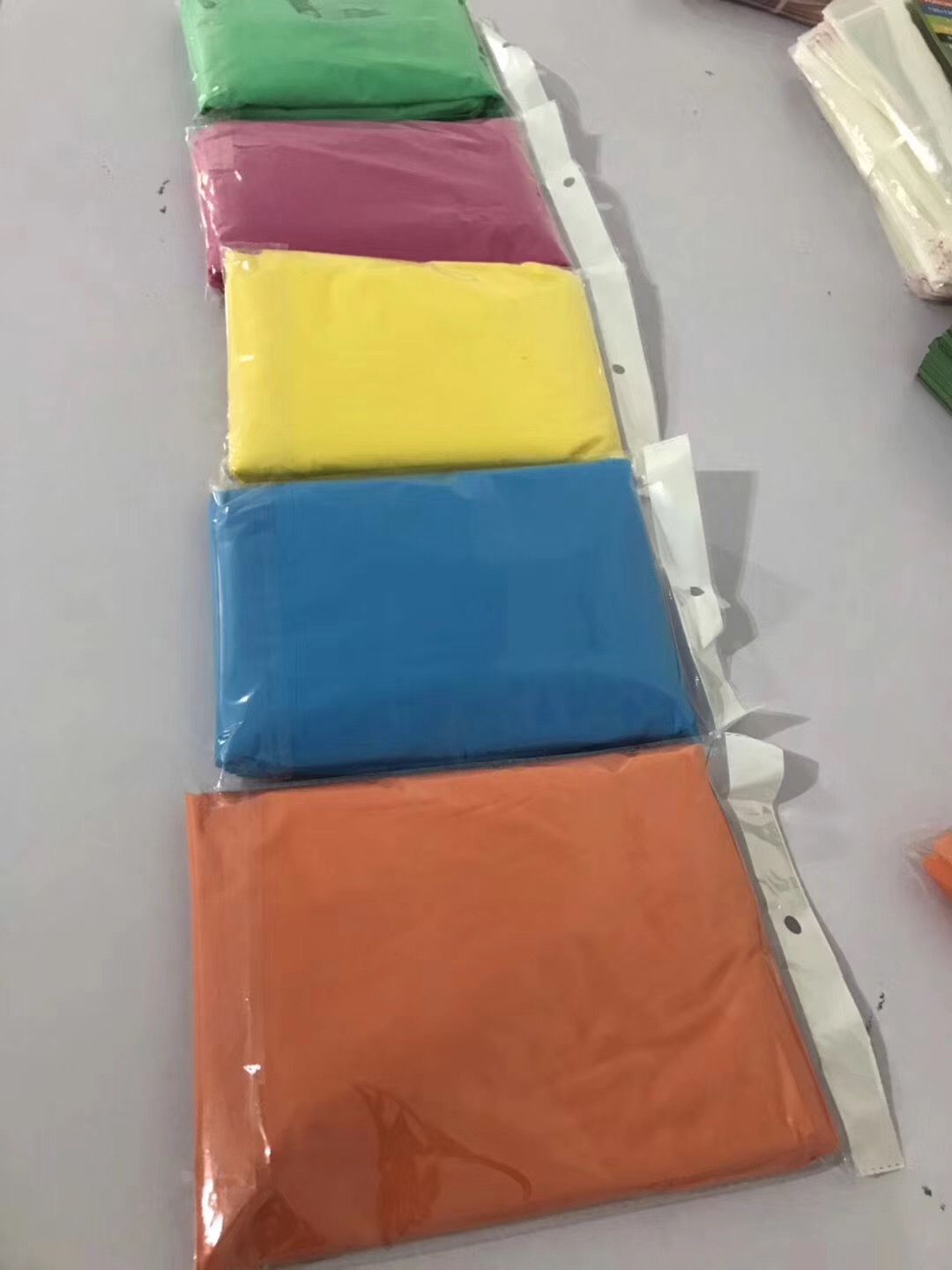 Yiwu factory direct sales of PEVA disposable cape with hat and rope raincoat and raincoat details Picture