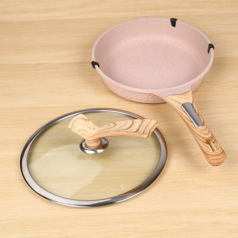 A double-bottom frying pan with a wood-grain handle and an induction cooker are available