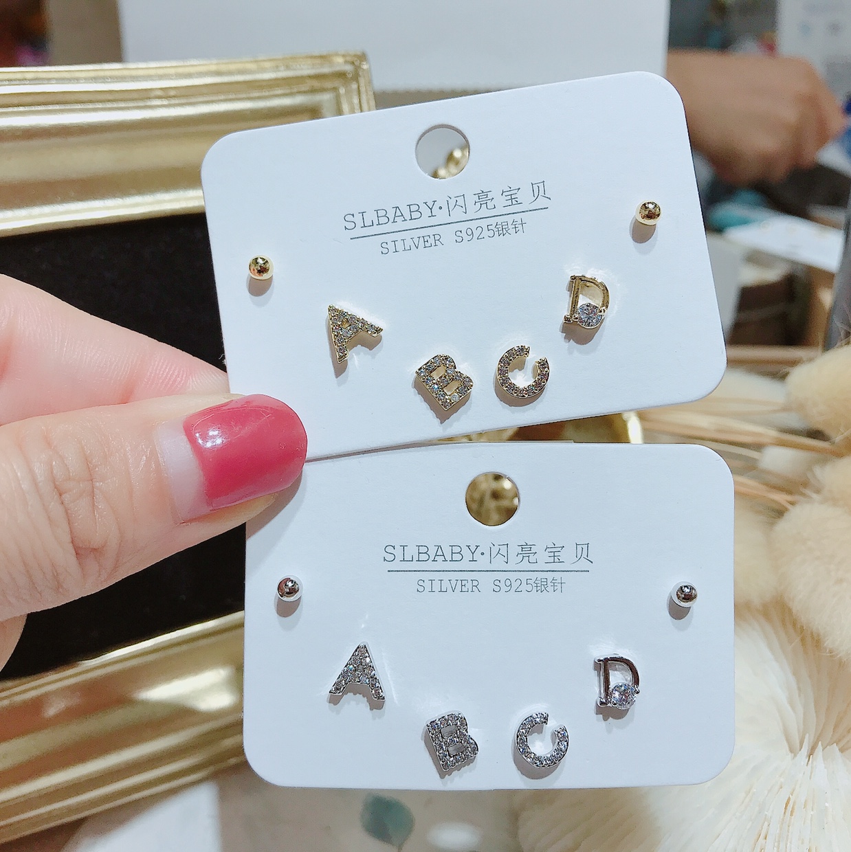 Abcd letters with multiple pairs of earrings