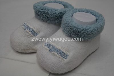 Napping baby neutral baby socks full figure