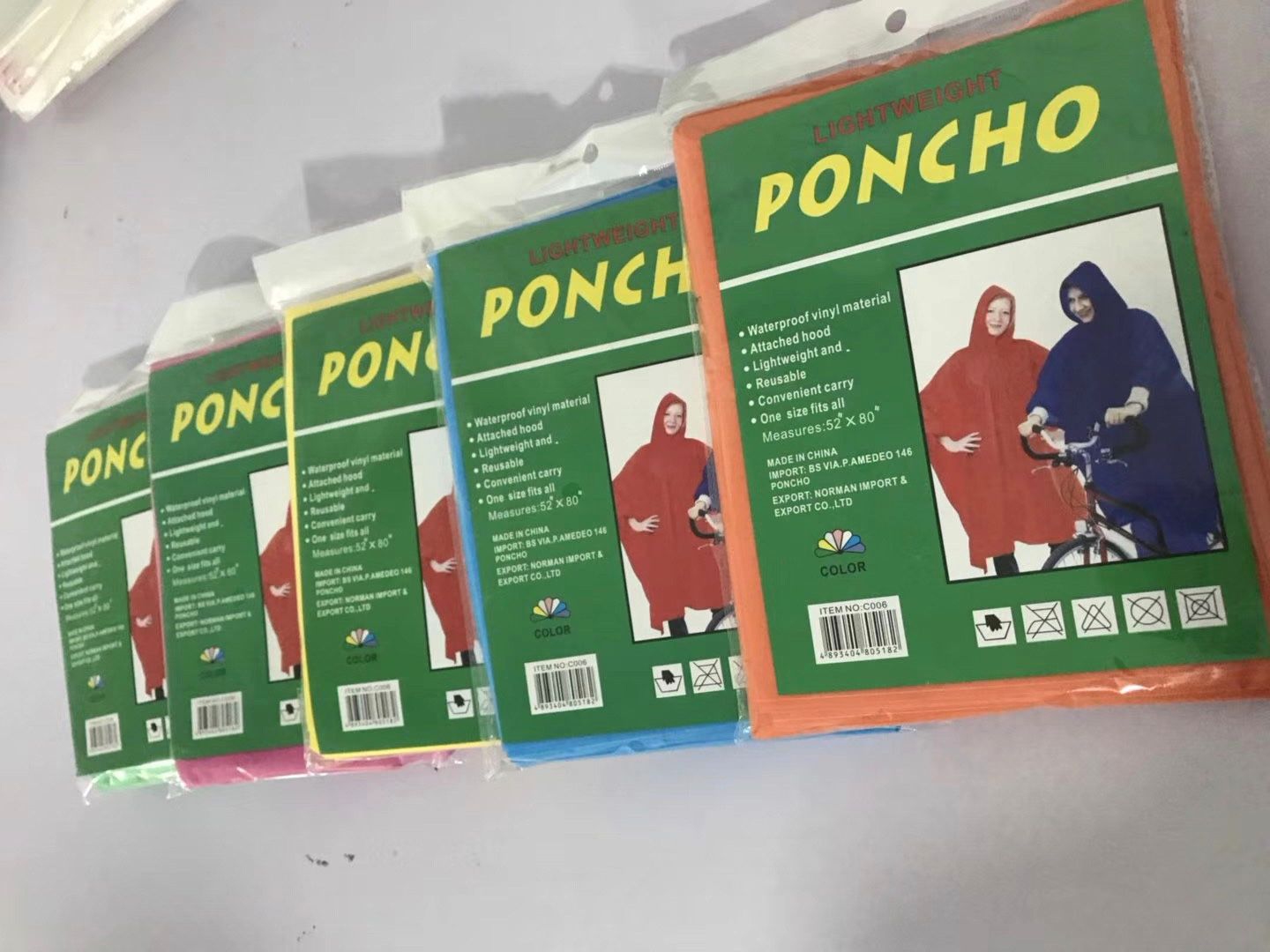 Yiwu factory direct sales of PEVA disposable cape with hat and rope raincoat and raincoat