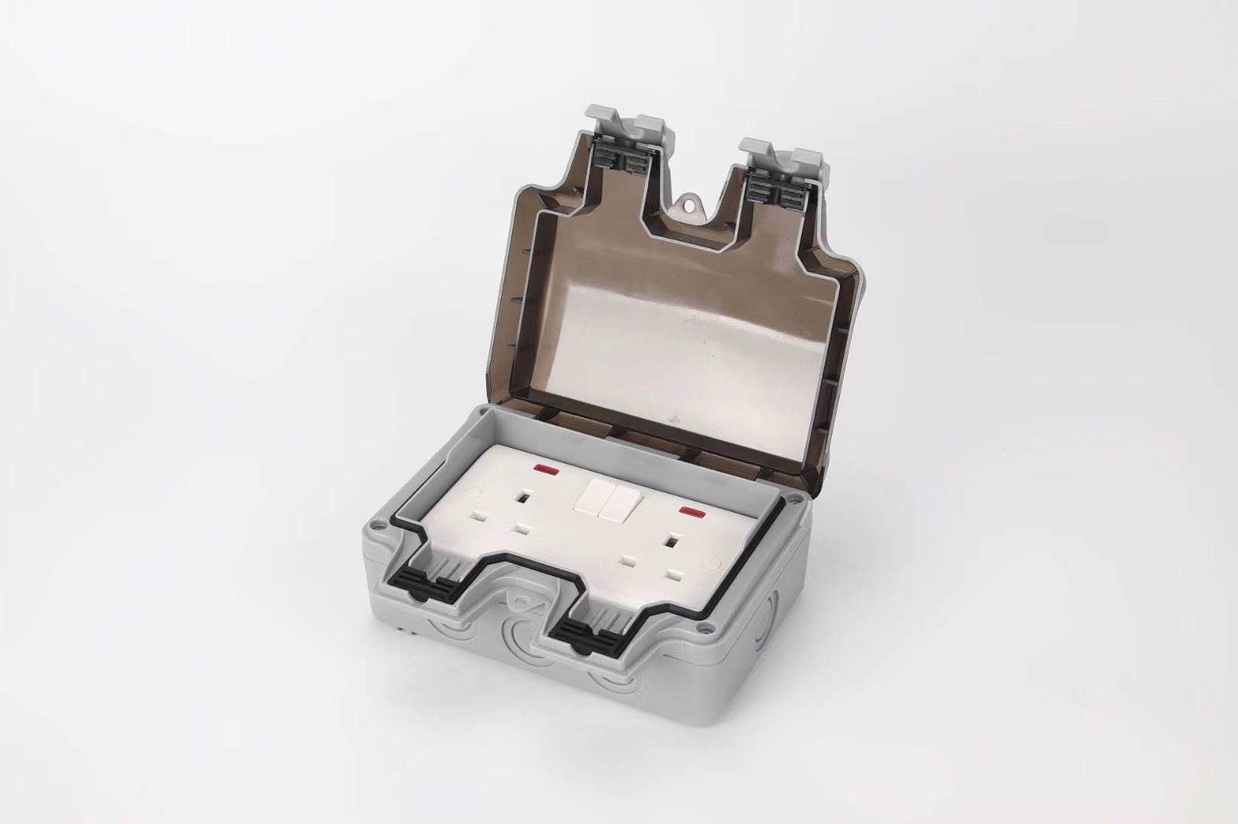 Waterproof box with plug-in board