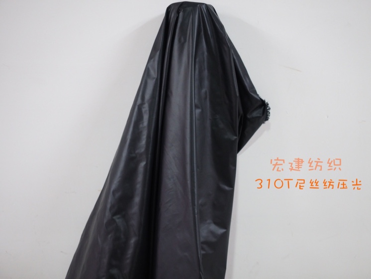 宏建纺织310T尼丝纺压光