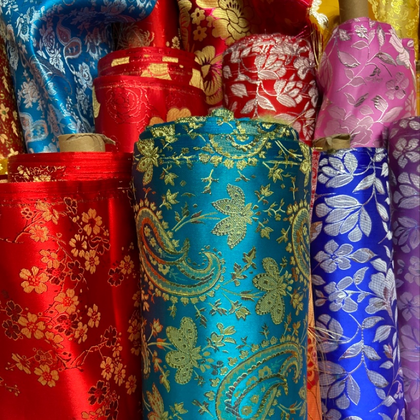 Blue embroidered, gold-embossed, fine leather, brocade fabric, decorative items, gift packaging fabric, clothing details Picture