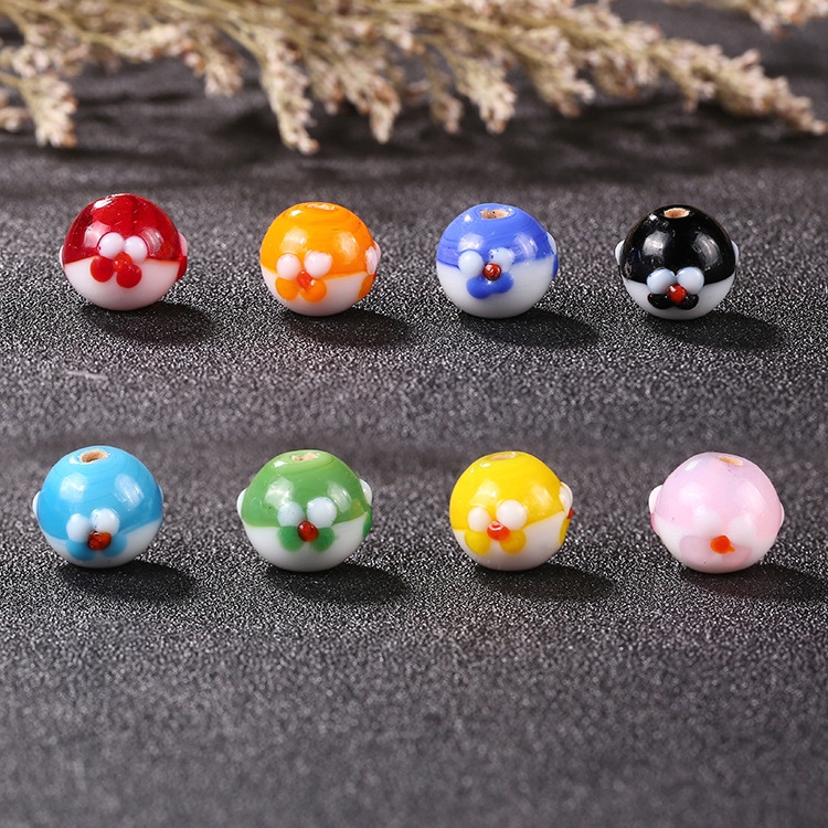 Nuevo estilo japonés pequeñas perlas de borrado tres lados cuatro pétalos perlas de borrado DIY accesorios accesorios al por mayor
