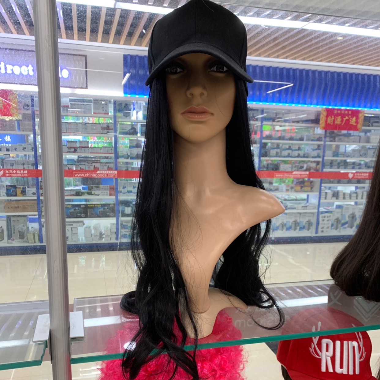 Ordinary high-temperature silk wig and hat sewn onto the hat. The wig is non-detachable. Custom-made and wholesale of cap wigs