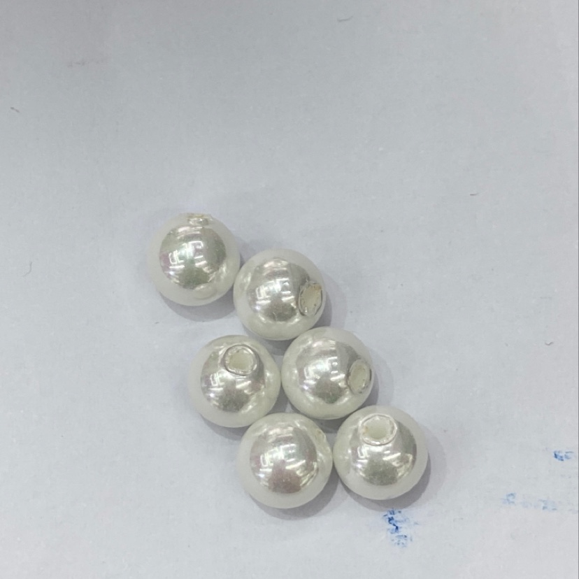 Medium-sized perforated glass pearl is versatile and elegant for clothing, jewelry and accessories