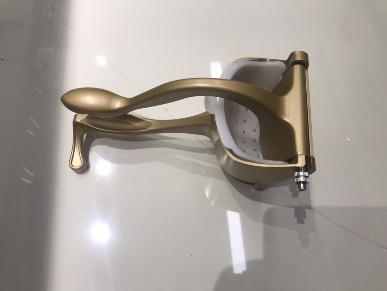 金色手动压汁器产品图