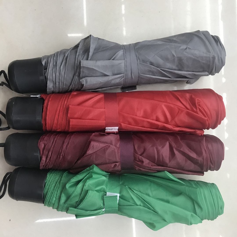 Multicolored three-fold umbrella