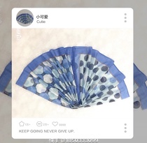 Blue polka dot shawl is a scarf