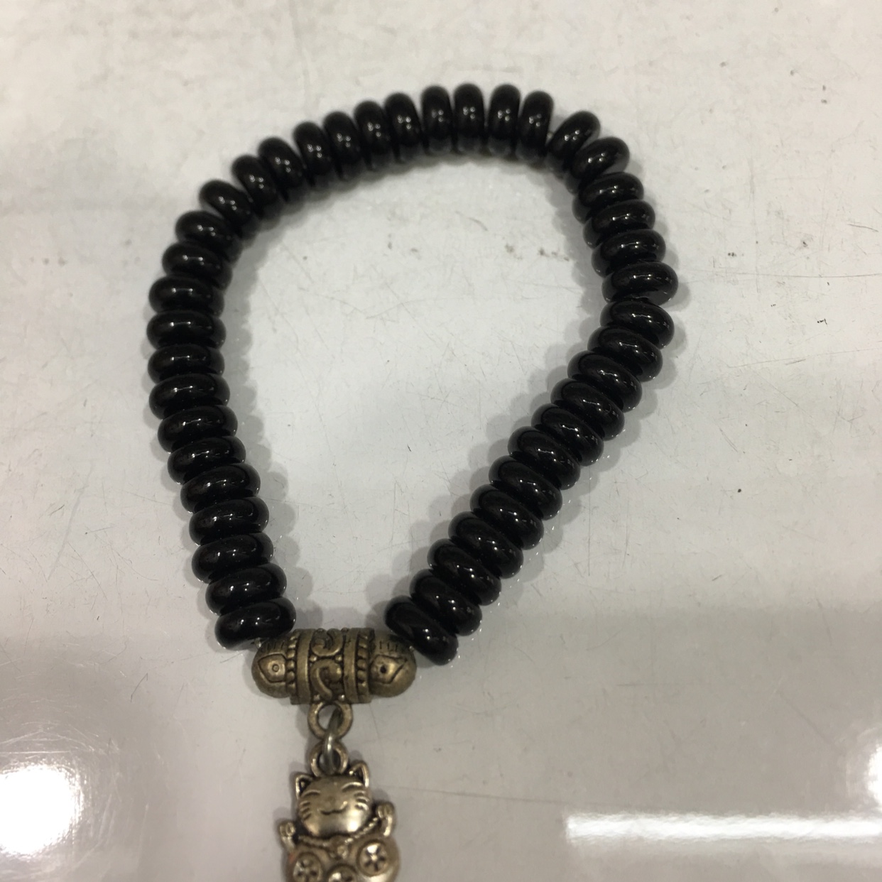 黑色扁珠挂坠手链产品图