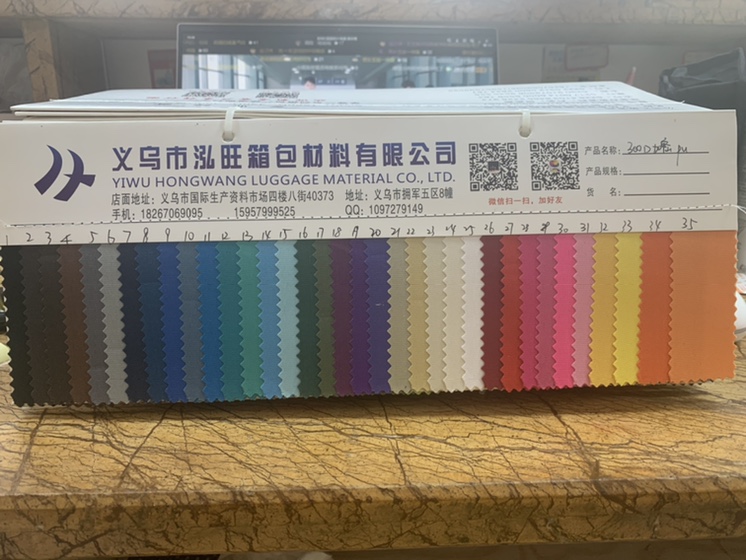 厂家直销大量现货批发阳离子点子布PVC箱包购物袋化妆包里布面料300D加密PU