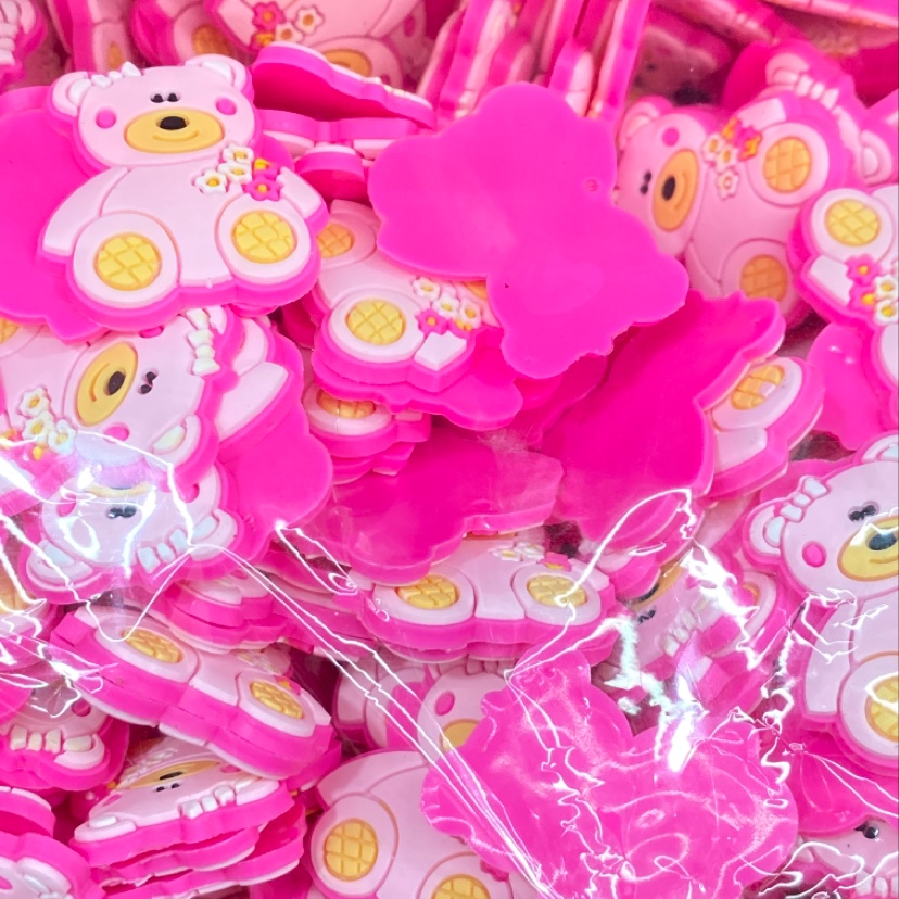 The cute PVC Barbie pink bear is a favorite among young girls and children for DIY jewelry and accessories