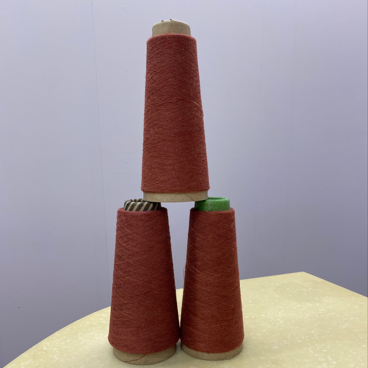 21-32 count full polyester yarns: brick red cotton yarns