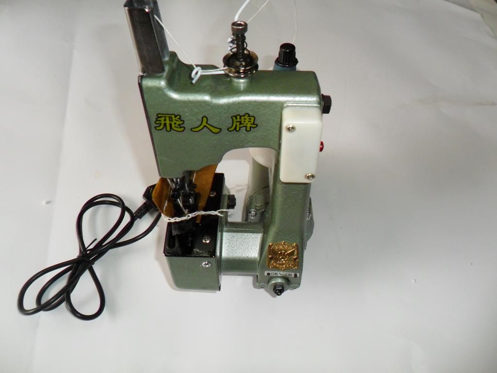Xiaofeiren genuine portable electric sealing machine, woven tape sealing machine, rice bag sealing machine. Huayi Packaging Machinery operates with integrity and offers excellent quality pic 1