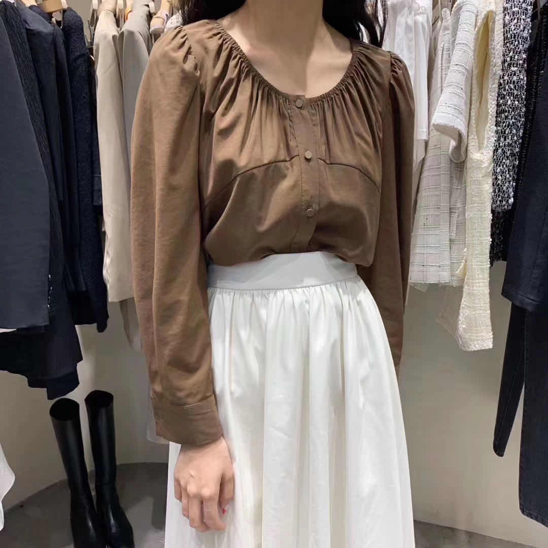 A simple dark brown collared shirt details Picture