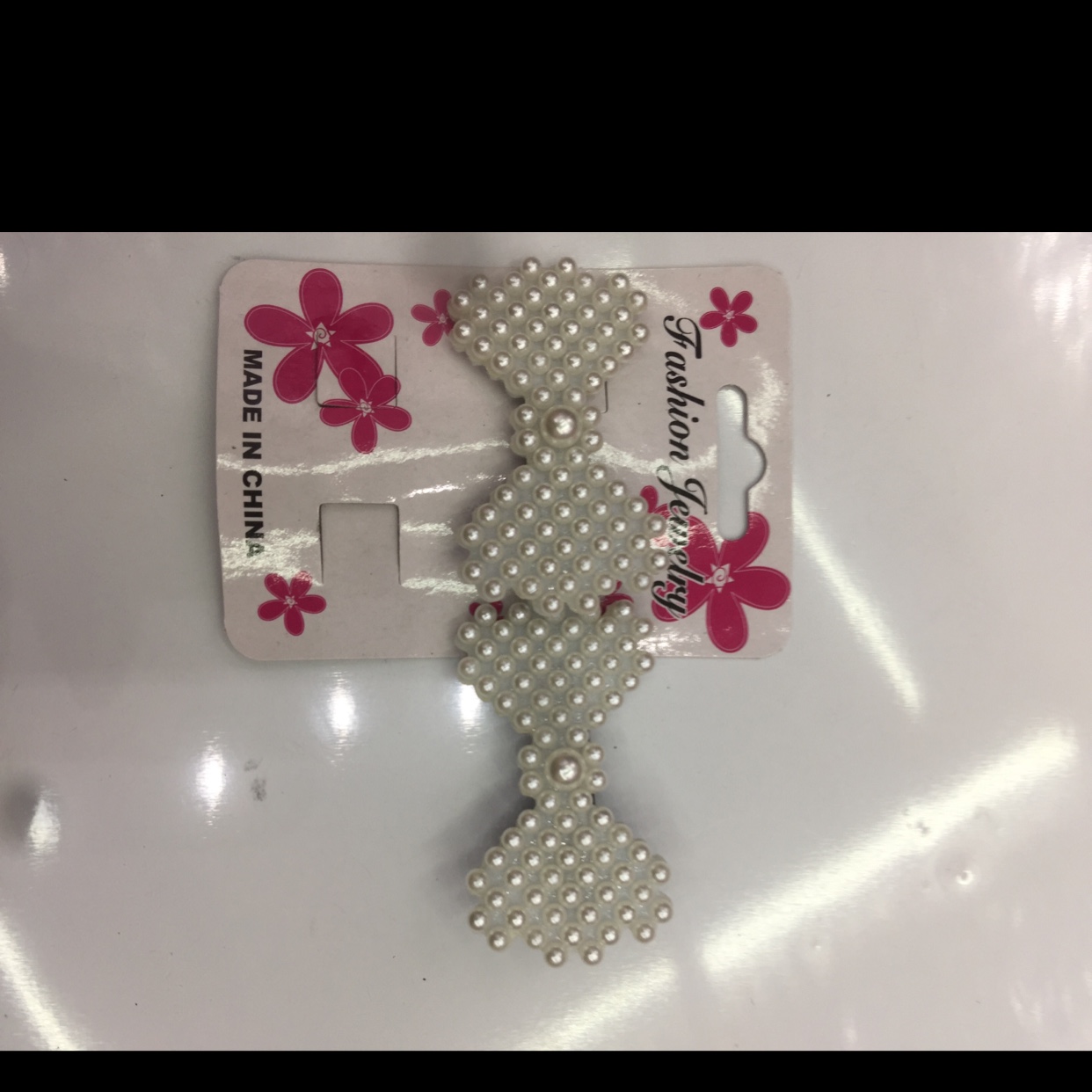 Pearl bow tie presser thumbnail