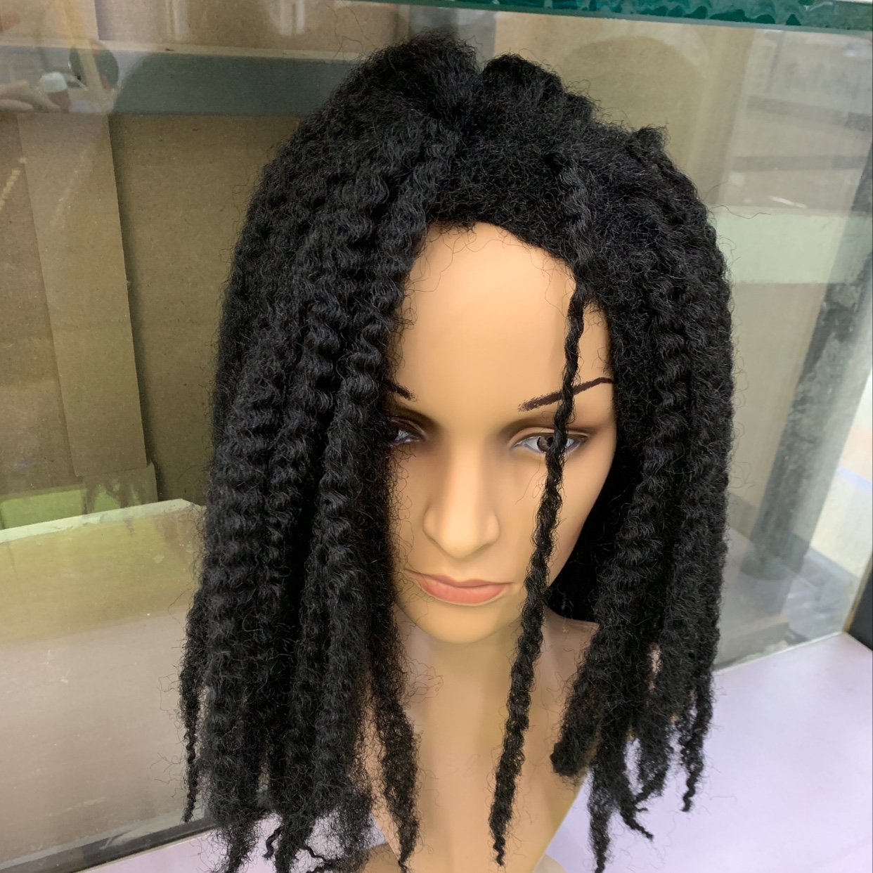 Custom-made and wholesale African dreadlock wigs and braided wigs