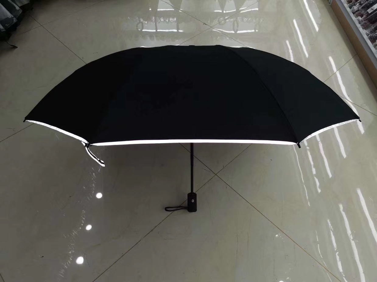 Three-fold self-opening and retracting reflective strip edge umbrella mixed color