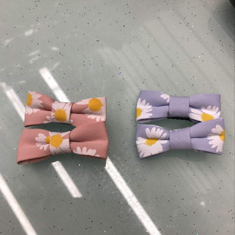 Korean version of the fashion small pair of Daisy clip fringe clip hair ornaments duck clip heals