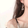 S925 Silver needle bow Dreamcatcher tassel earrings, a female Internet celebrity with an extremely ethereal charm, Korean long pearl earrings with pomelo ears Application Scenario