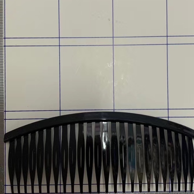 A 24-tooth hair comb