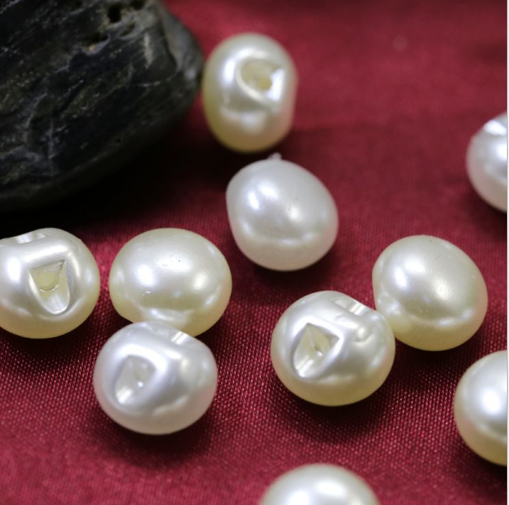 Pearl steamed bun slant hole button 11MM