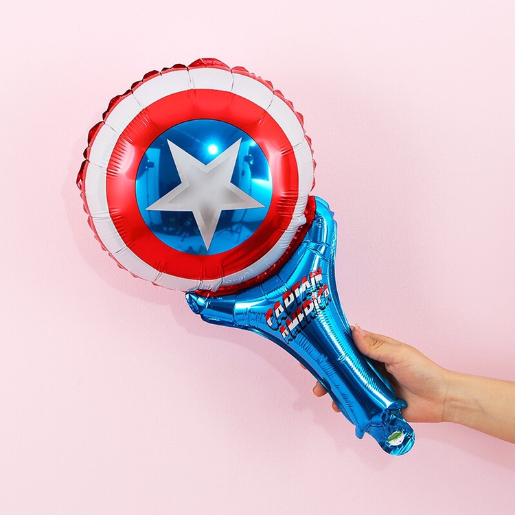 Children stick aluminum film balloon to push