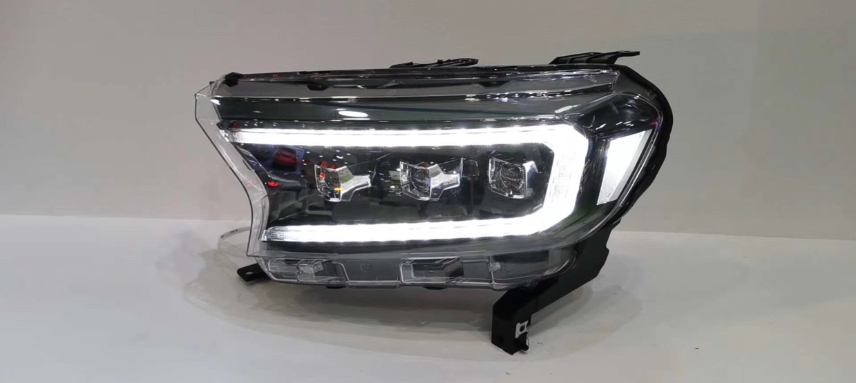 Specialized production of Ford headlight-specific auto and motorcycle parts with original factory quality
