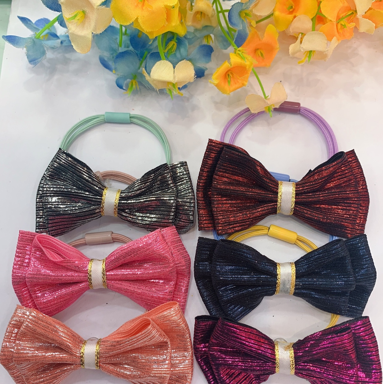 A dark gold bow tie thumbnail