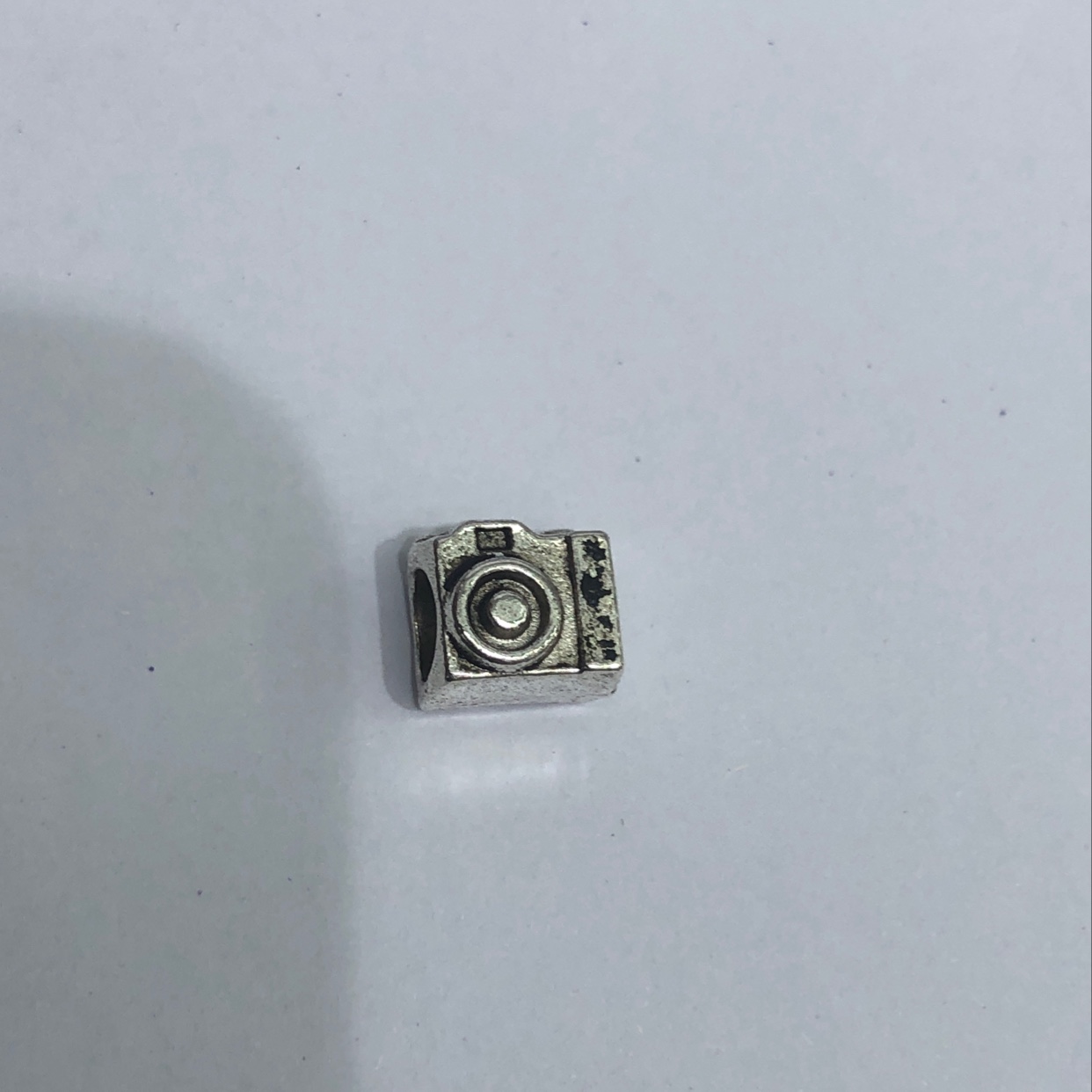 路路通，大孔珠，小相机