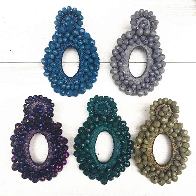 The crocheted earrings lie on 051 thumbnail
