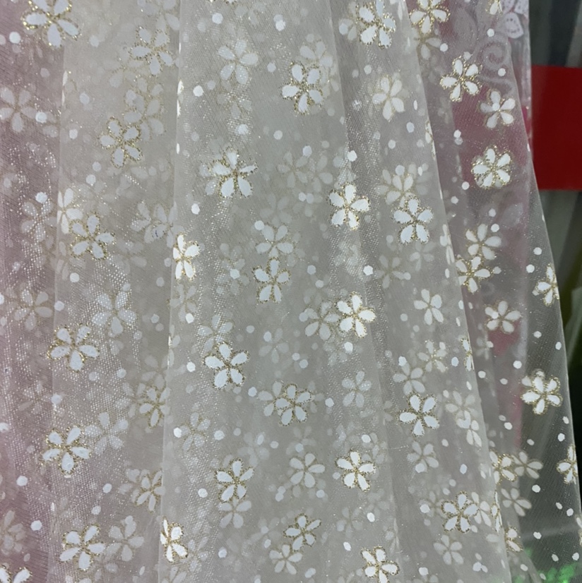 White patterned gauze fabric is sold directly by the manufacturer. New products of the season are available for wholesale or retail