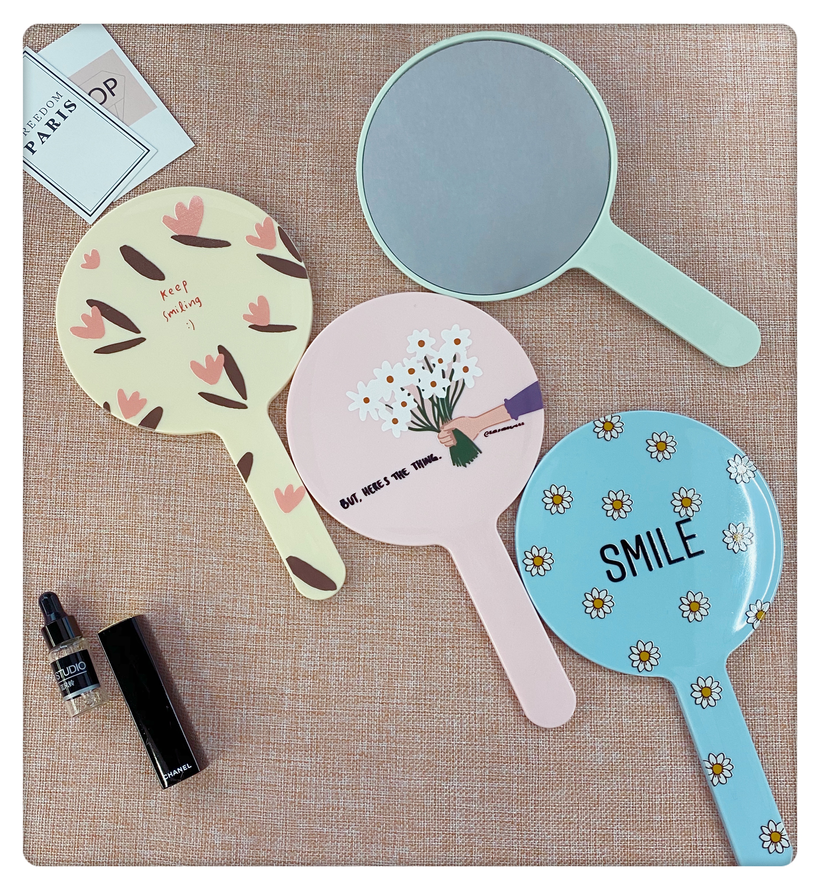 Colorful circular hand-held mirror with painted handle mirror Item Picture