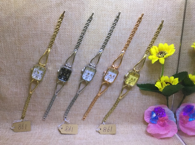 A simple and individual square quartz women's bracelet watch with a bracelet style