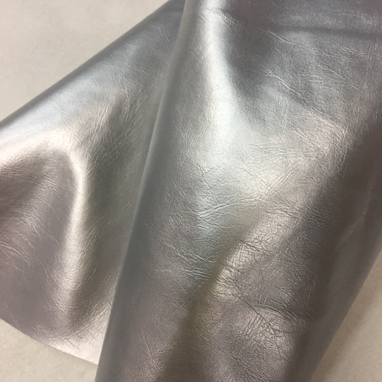 Edge-wrapped leather