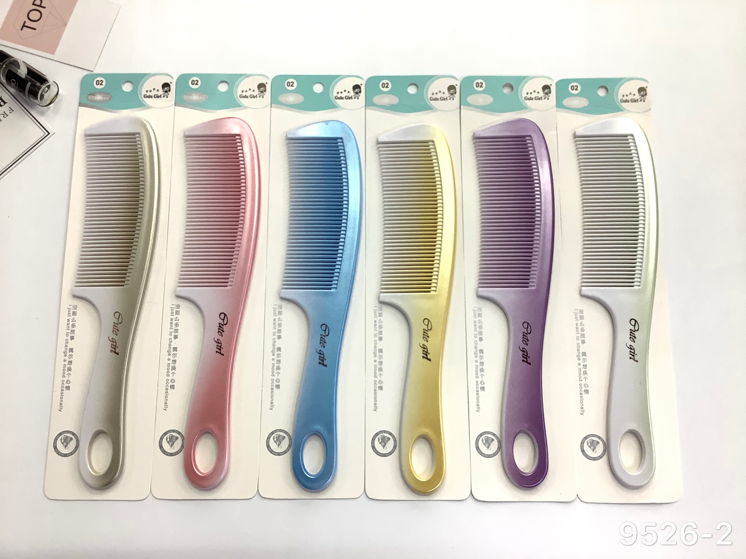 The spray-painted comb features a simple design concept and shape Item Picture