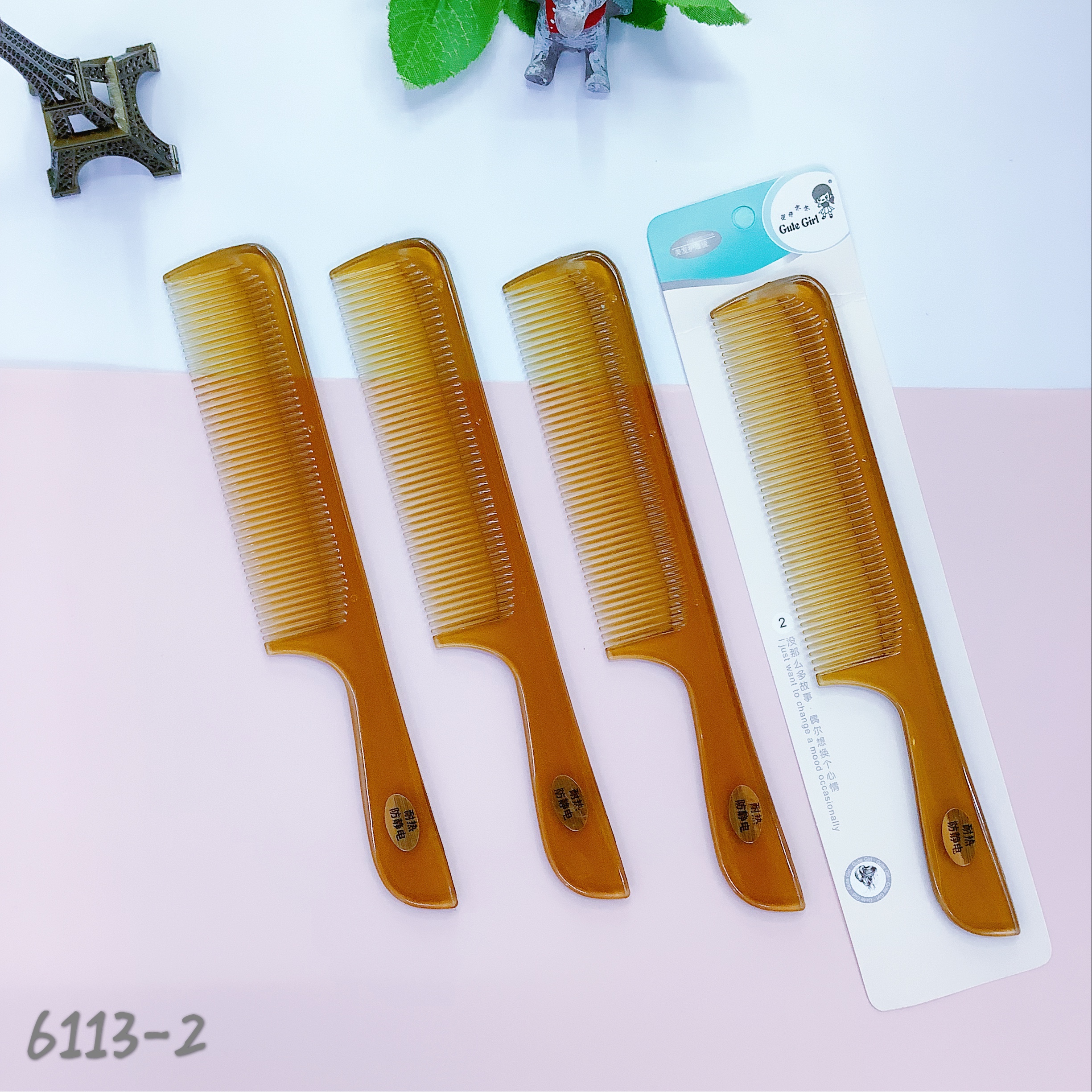 Amber and copal colored combs are placed on horn-shaped combs undefined