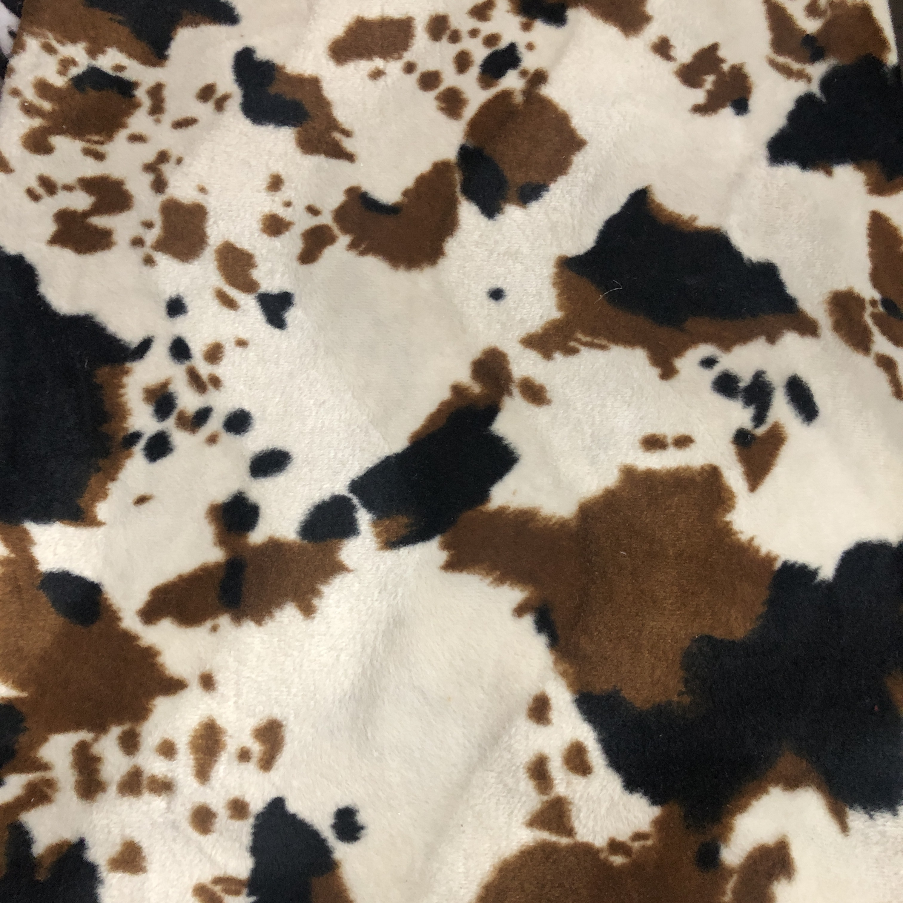 Factory direct sales of thickened brushed cow print short plush fabric for the current season's new products Item Picture
