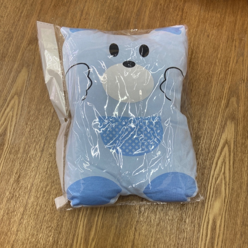 Pillow-shaped pillow with cotton mouth and wombat style details Picture