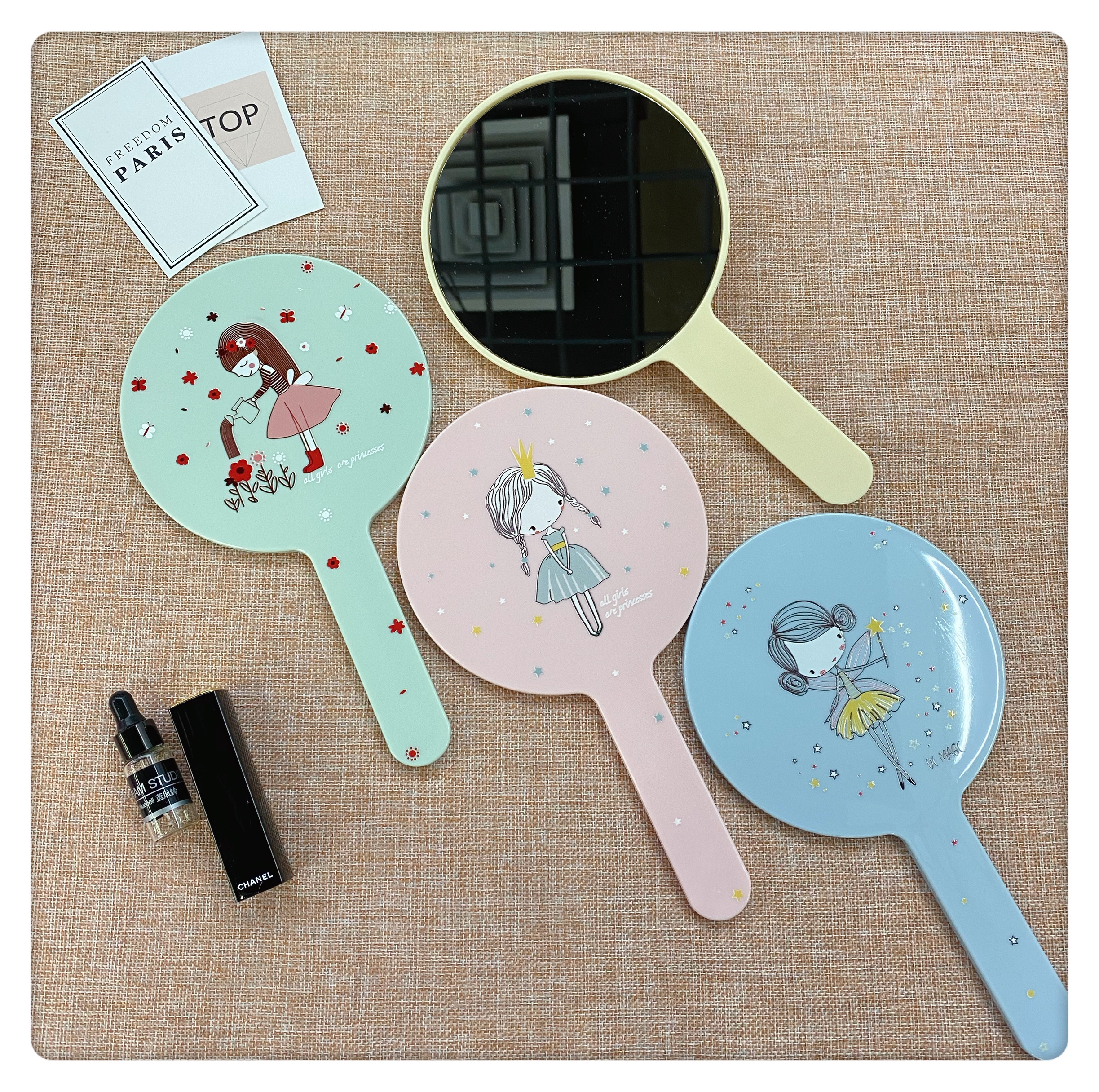 Colorful circular hand-held mirror with painted handle mirror Specification image
