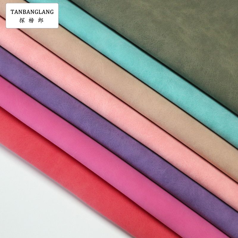 Factory direct sales of artificial leather, matte sheepskin, bag and shoe materials, cosmetic and leather materials, two-color suede matte pu leather