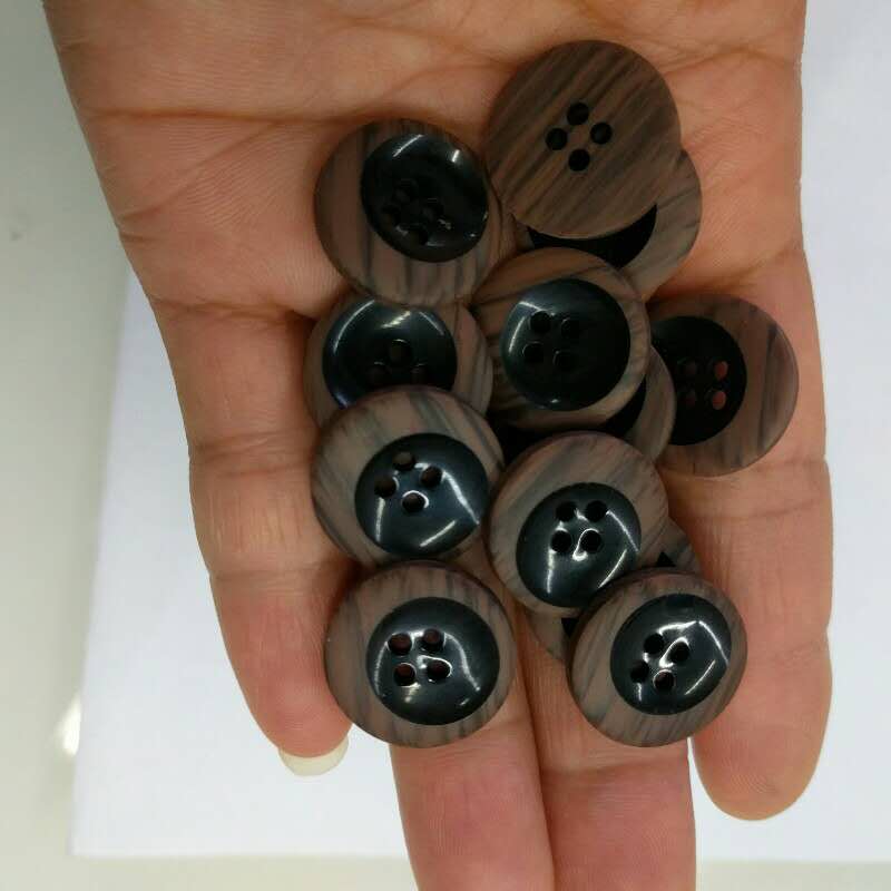 The Latest Explosive Rod Flower Button Special-Shaped Beveled Edge Black Circle Four Eyes Buckle Specification drawing