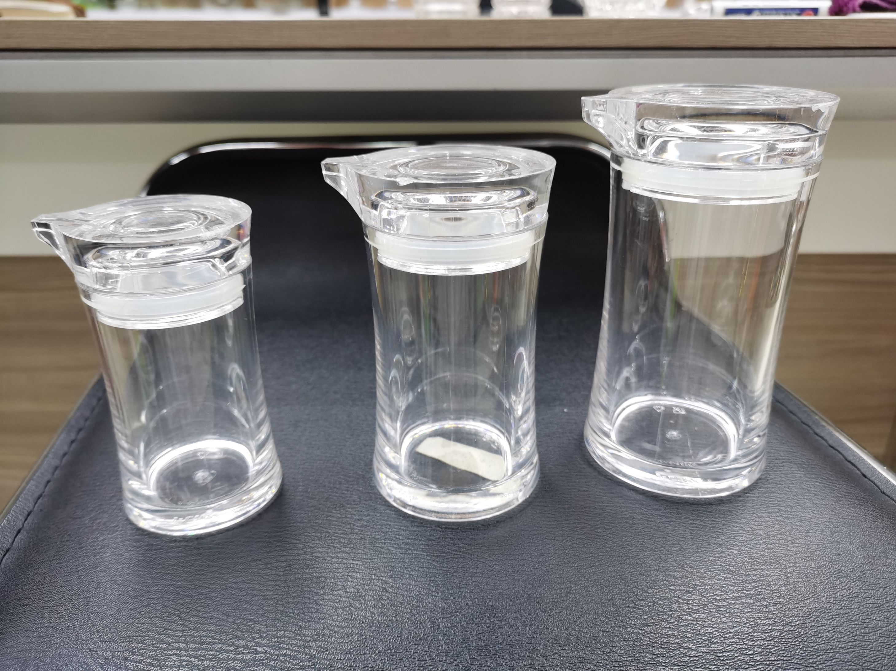 Plastic acrylic oil cans and bottles details Picture