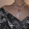 设计个性珍珠OT扣满钻太阳花吊坠项链白底实物图