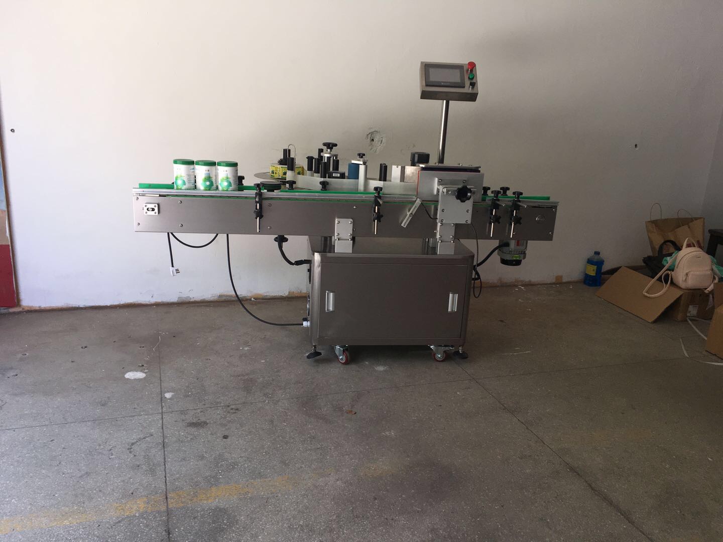 Fully automatic round bottle labeling machine packaging equipment is in stock and available for immediate delivery from the manufacturer undefined